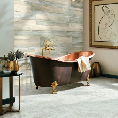 tile flooring in an elegant North Florida bathroom with copper tub